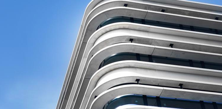 Tic Tric Trac The façade is made up of the thermal shell and curtain-type concrete sections. The benefit: the sections also create their own high levels of shade so there was no need to install additional sun shading.