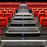 Grandstand seating with integrated steps using Comfodeck powered by alkus® panels for temporary event structures